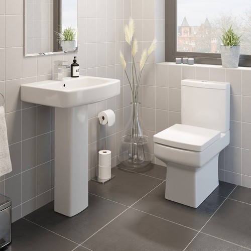 Close coupled toilet and basin - coupled,